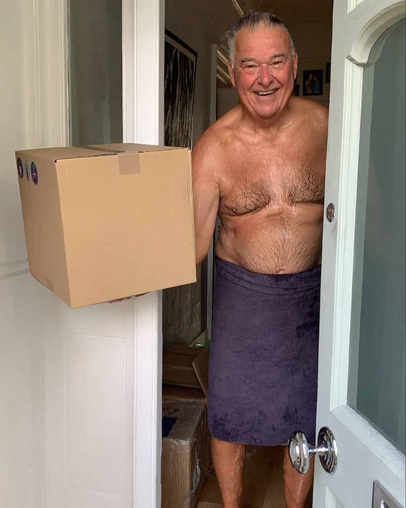 Man holding seed box